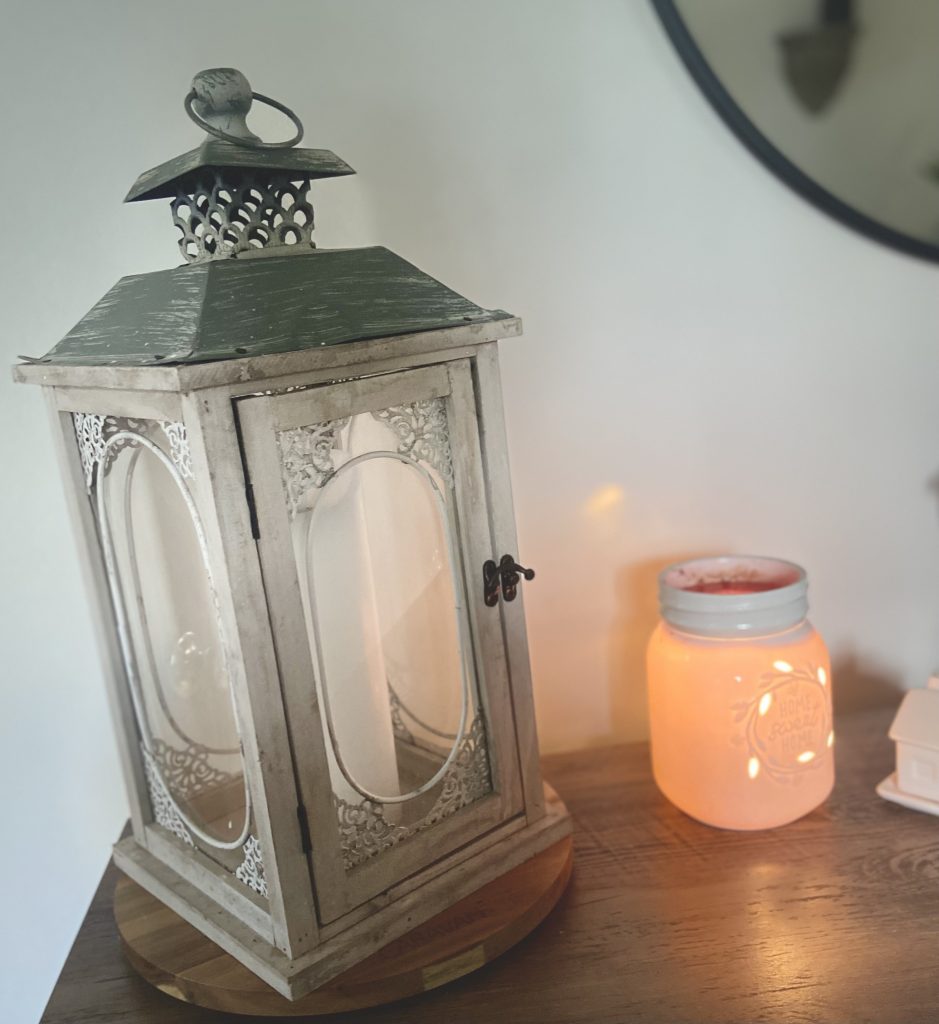 thrifted white lantern and second hand wax burner