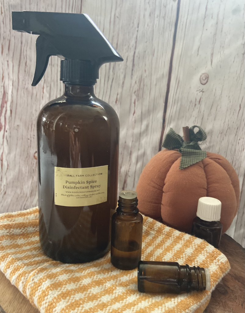 Disinfectant Spray with brown essential oil bottles 