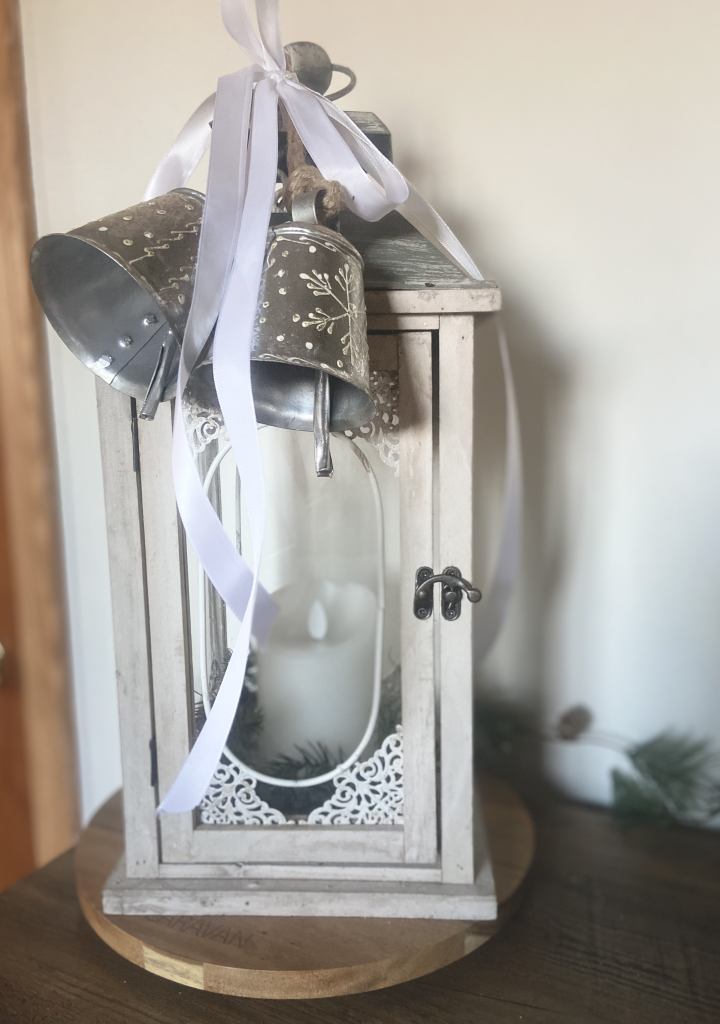 White Lantern with white ribbon and candle