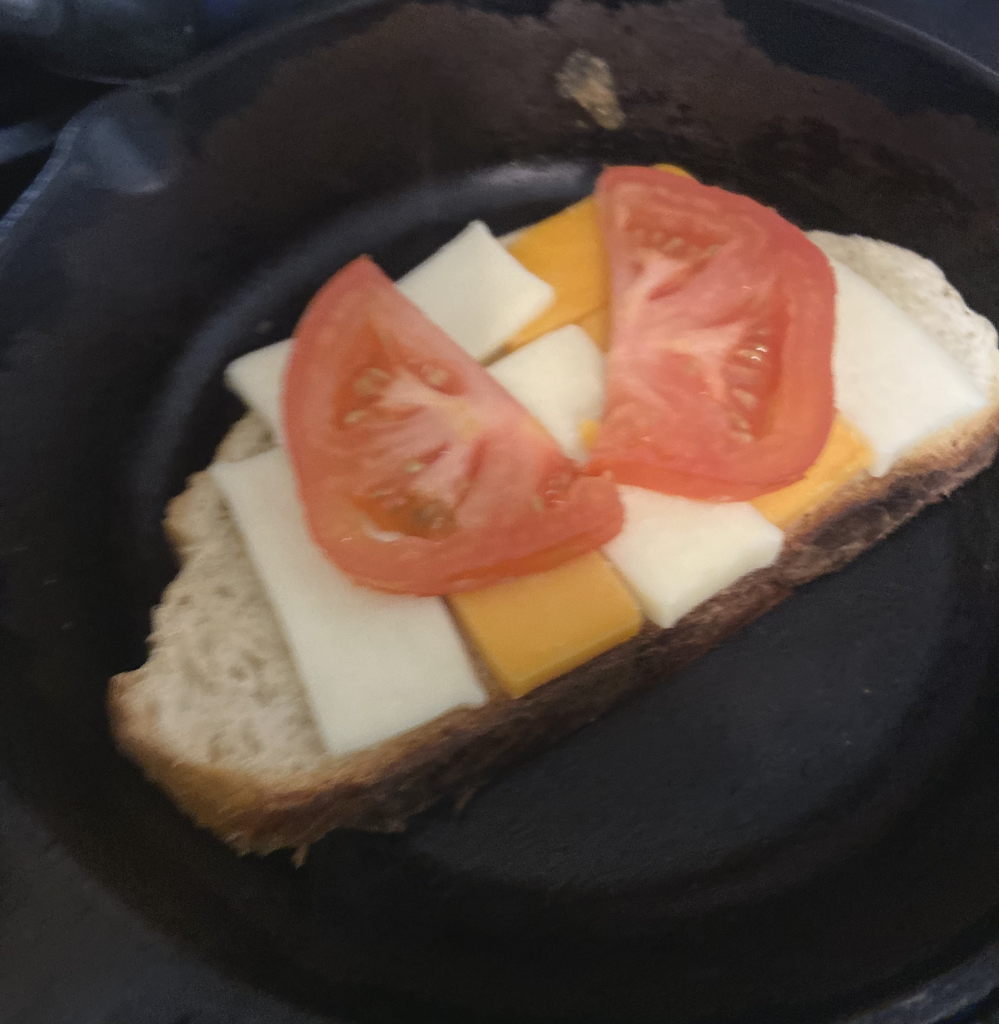 sourdough grill cheese in a cast iron skillet